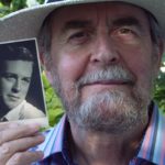 Brian Finney Author Photo Holding Youth Photo